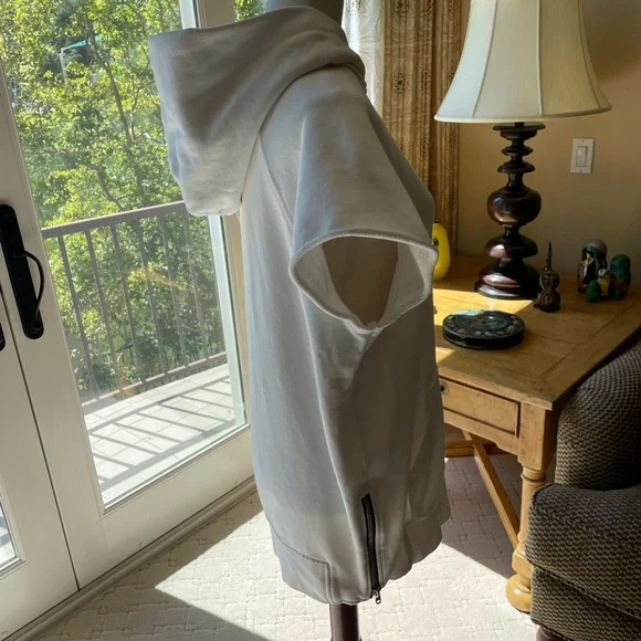 Fear of God FOG medium white short sleeve hoodie. Front pocket, side zippers.